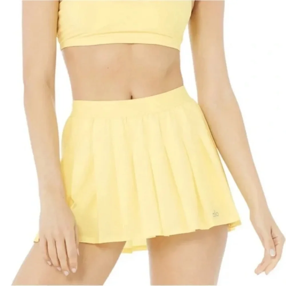 NWOT ALO YOGA Varsity Pleated Tennis Skirt Buttercup Yellow Size XXS
